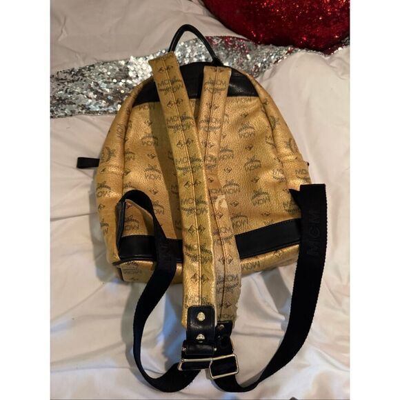 MCM Visetos Dual Stark Backpack convertible crossbody bag studded gold black main image 11